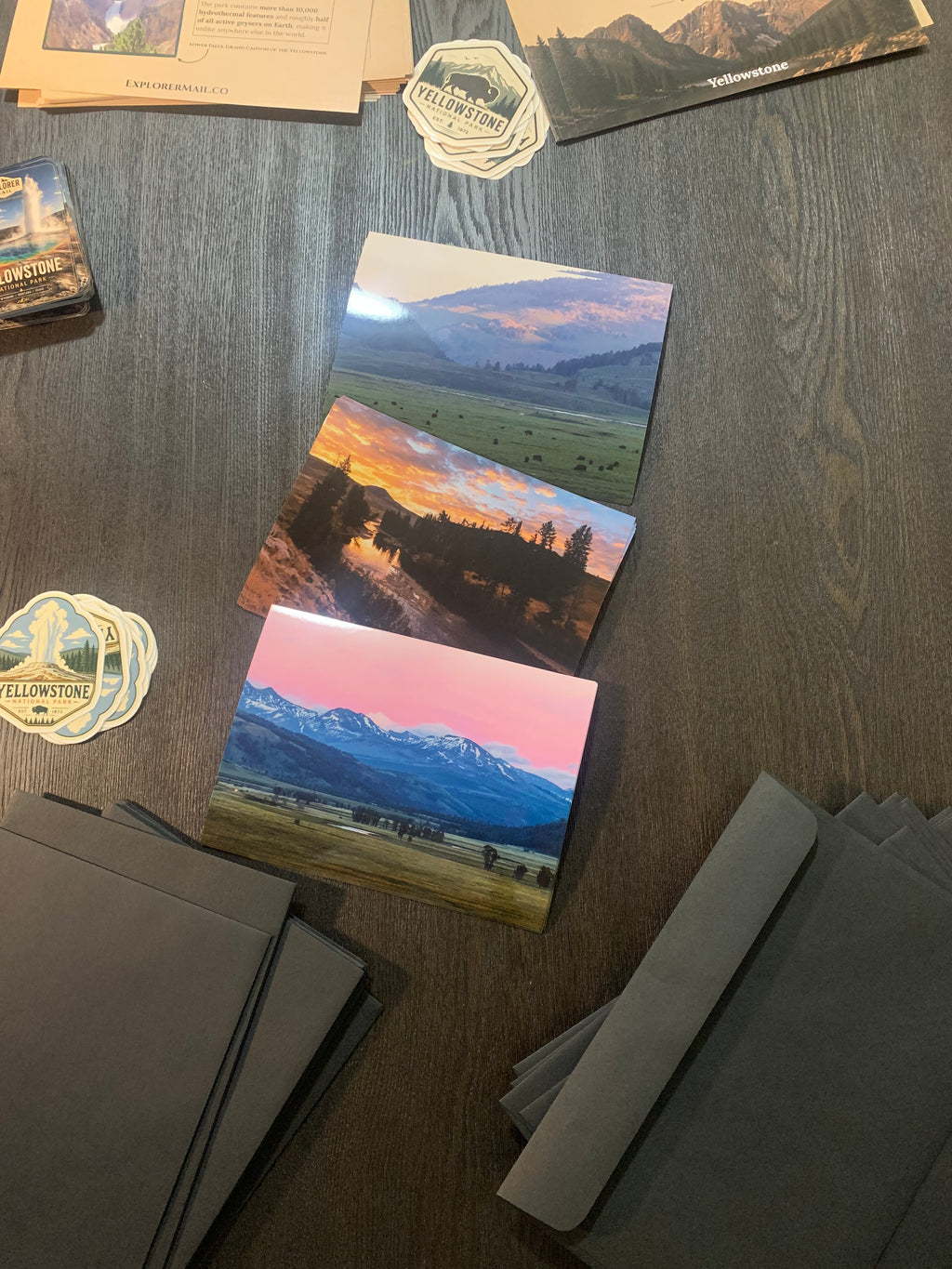 Explorer Mail National Park photo prints and sticker beside mailing envelopes